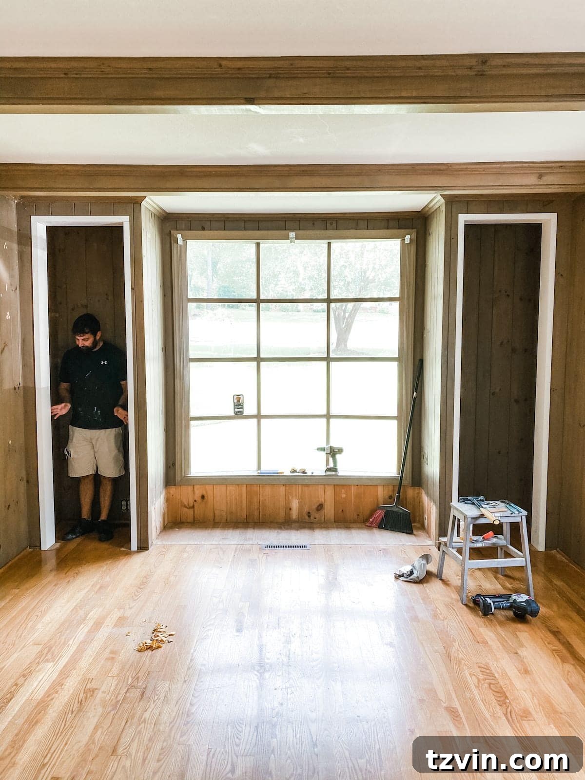 Sanding newly installed wood framing for built-in shelves