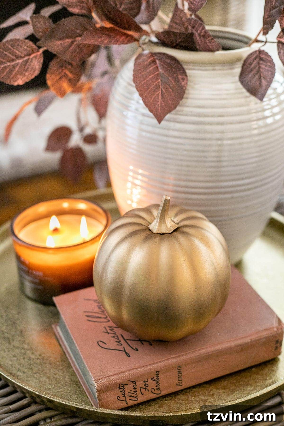 Thrift Store Gems: Your Ultimate Fall Decor Haul 13 fall decor on a tray with vase of leaves, candle, and pumpkin