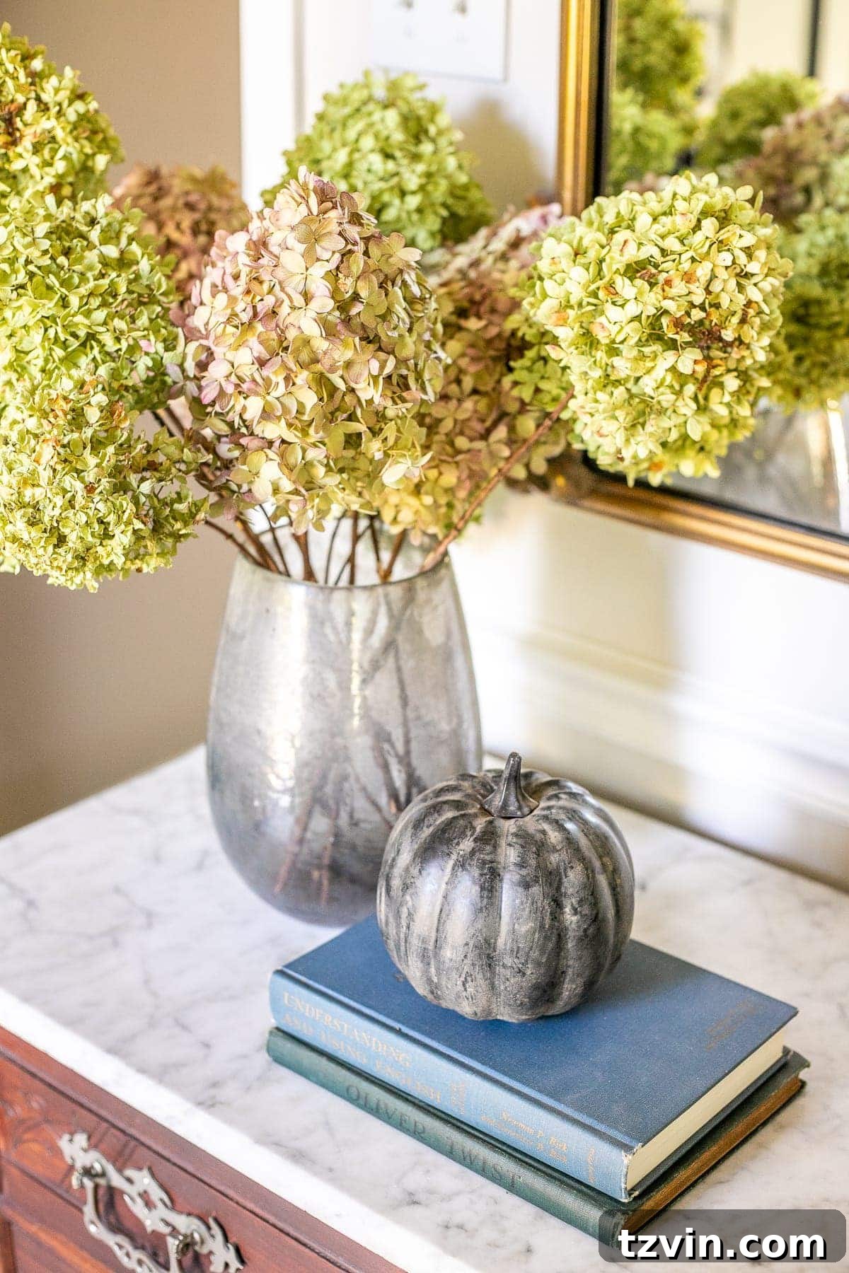 Thrift Store Gems: Your Ultimate Fall Decor Haul 14 painted pumpkin with dried hydrangeas