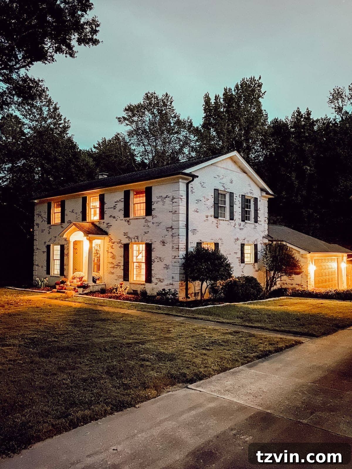 Autumnal Porch Palette 6 limewashed brick colonial house at night