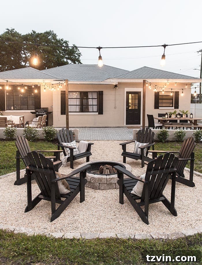 15 Mesmerizing Fire Pit Decor Transformations 14 Backyard fire pit with string lights and a charming pea gravel base