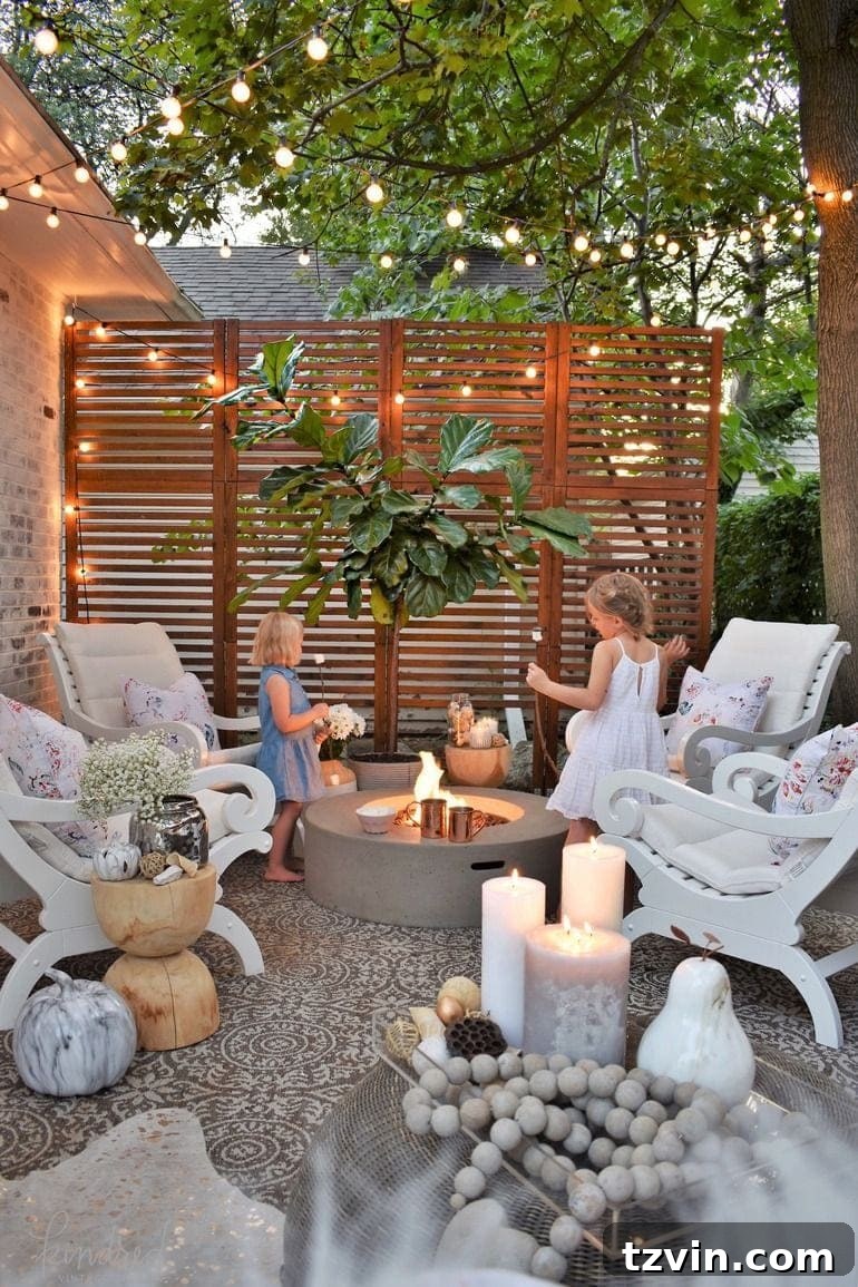 15 Mesmerizing Fire Pit Decor Transformations 5 Dreamy fire pit area with stenciled patio, string lights, and wood screen