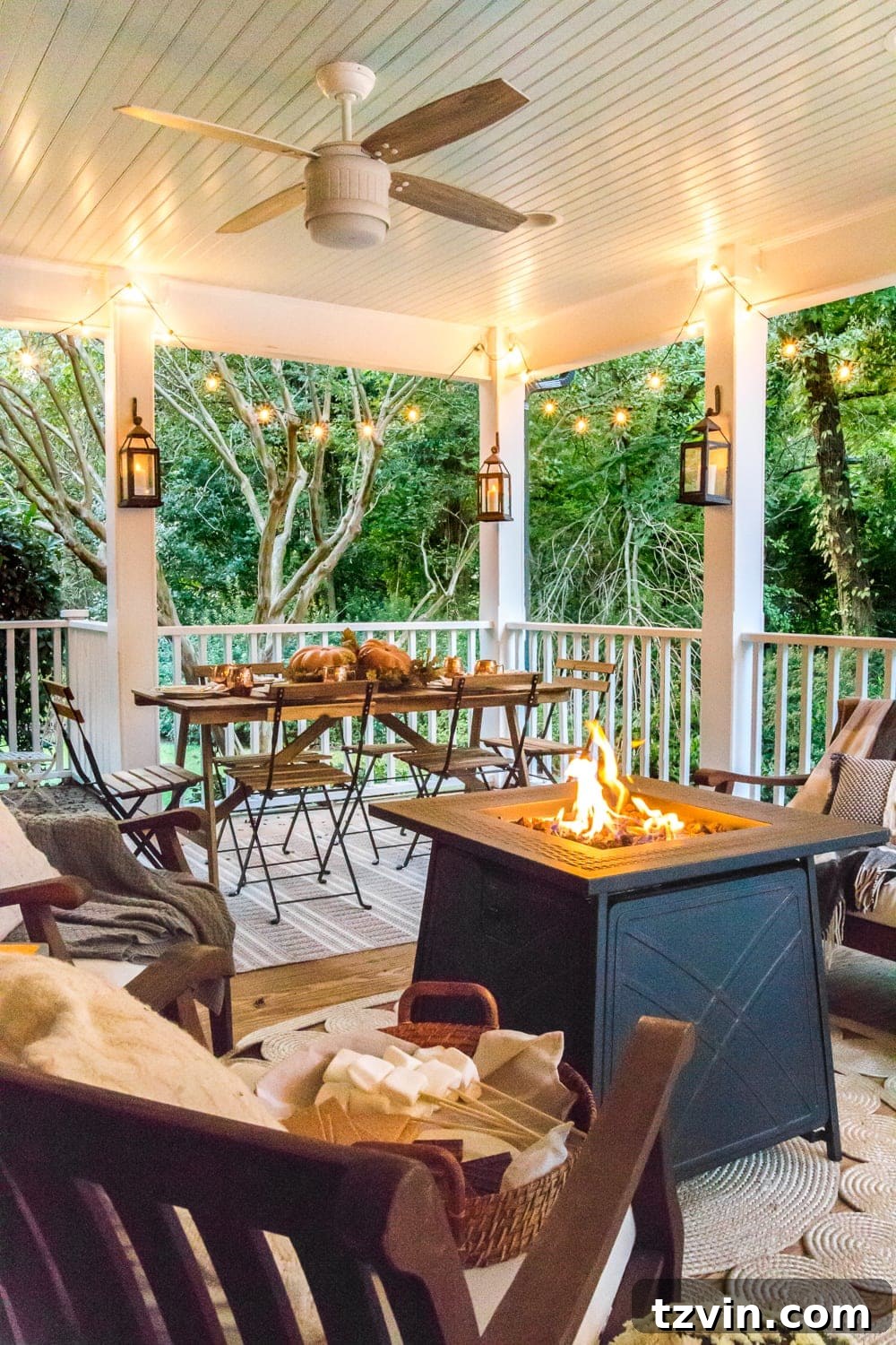15 Mesmerizing Fire Pit Decor Transformations 7 Cozy back porch with propane fire pit, lanterns, and ambient string lights