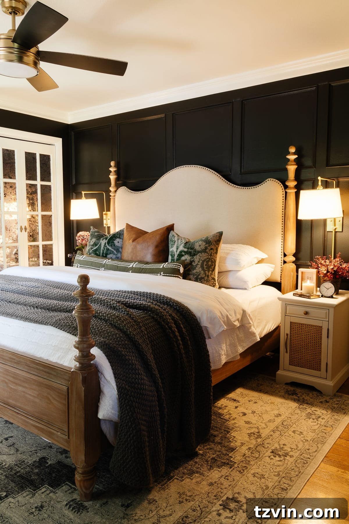 Cozy fall bedroom decor with warm lighting and a comfortable bed, inviting relaxation.