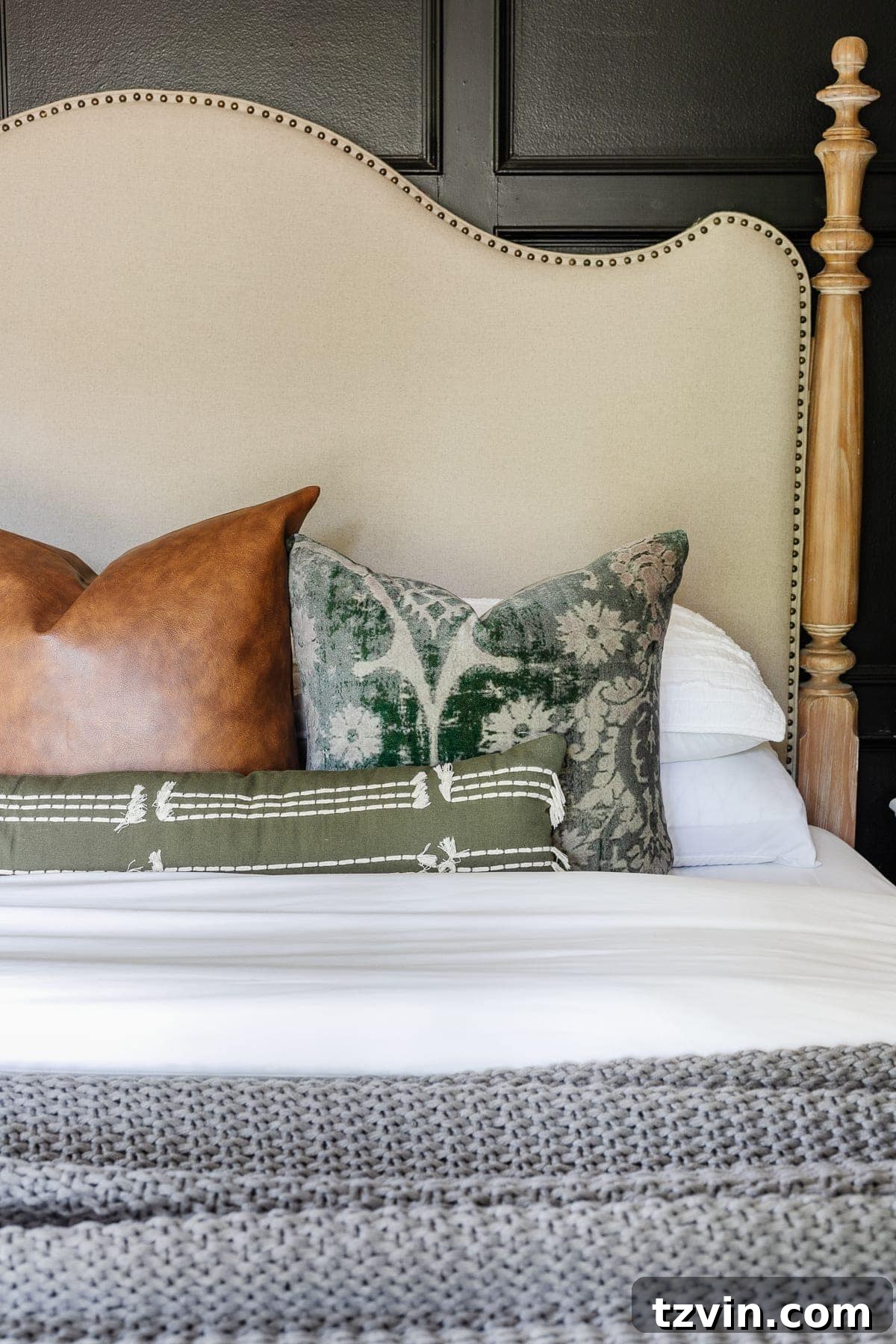 Transform Your Space: The Art of Pairing Throw Pillows 2 Elegant throw pillows on a bed, showcasing harmonious pattern and texture mixing in a cozy bedroom setting.