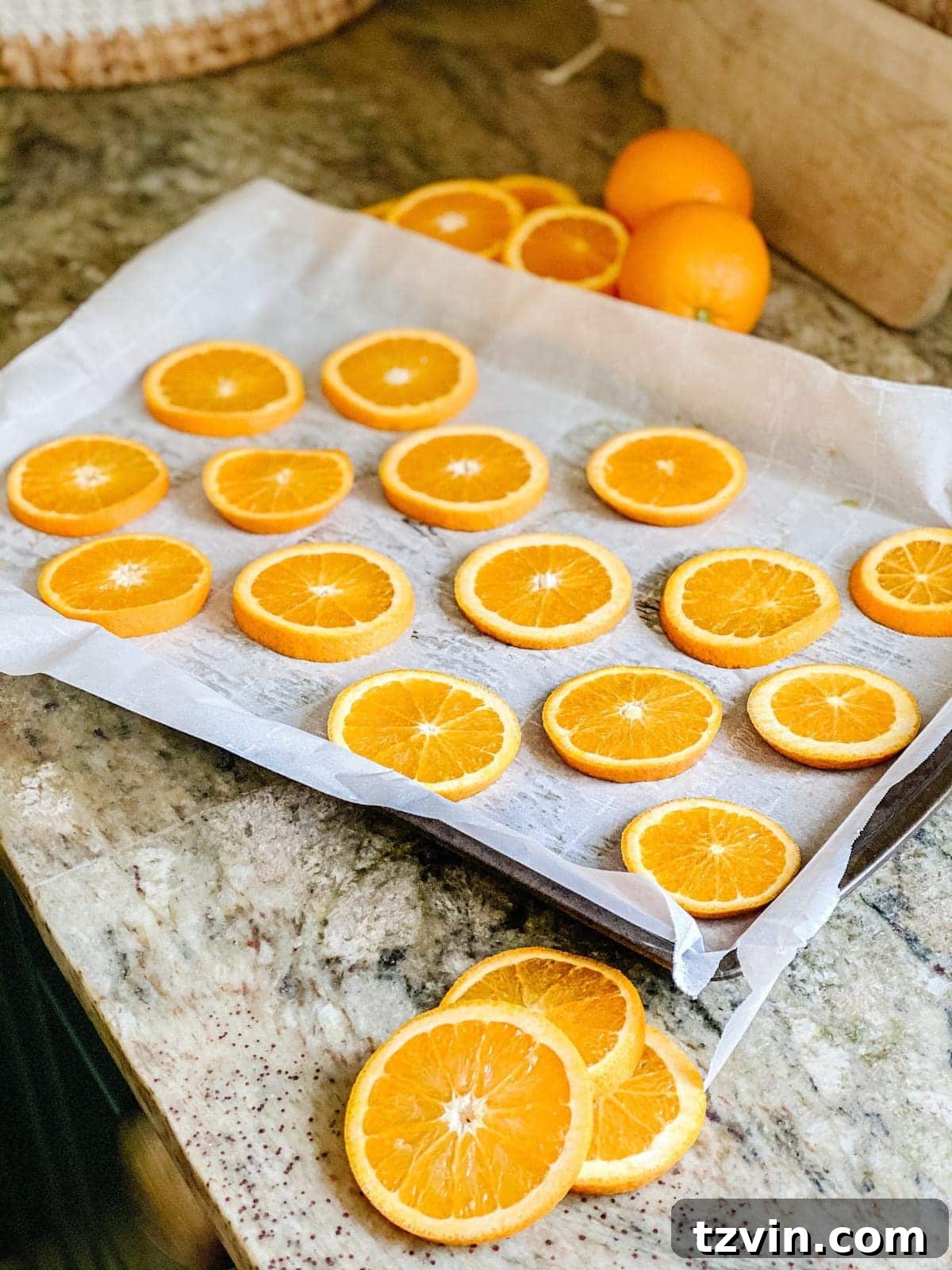Harvesting Holiday Beauty: Drying Fruit and Preserving Leaves 7 Transforming fresh oranges into beautiful dried slices for Christmas decorating