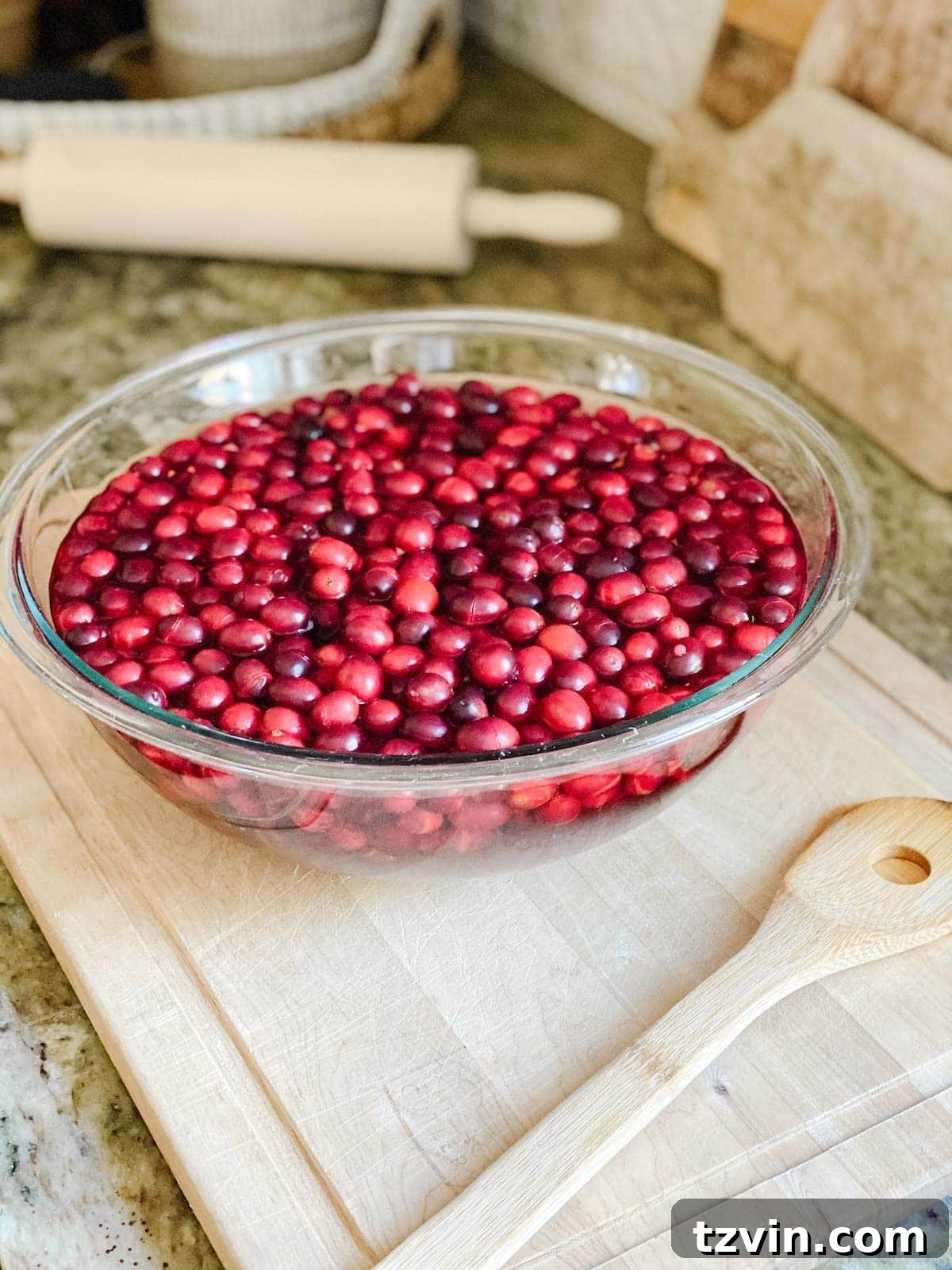 Harvesting Holiday Beauty: Drying Fruit and Preserving Leaves 8 Blanching fresh cranberries before drying them for Christmas decorations