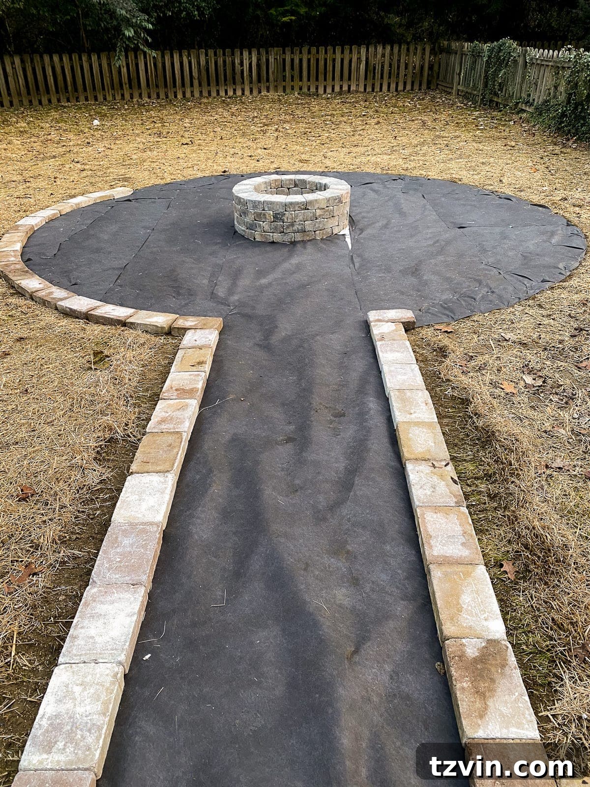 Weekend Pea Gravel Fire Pit: A DIY Build 17 landscape fabric around a fire pit edged with stones