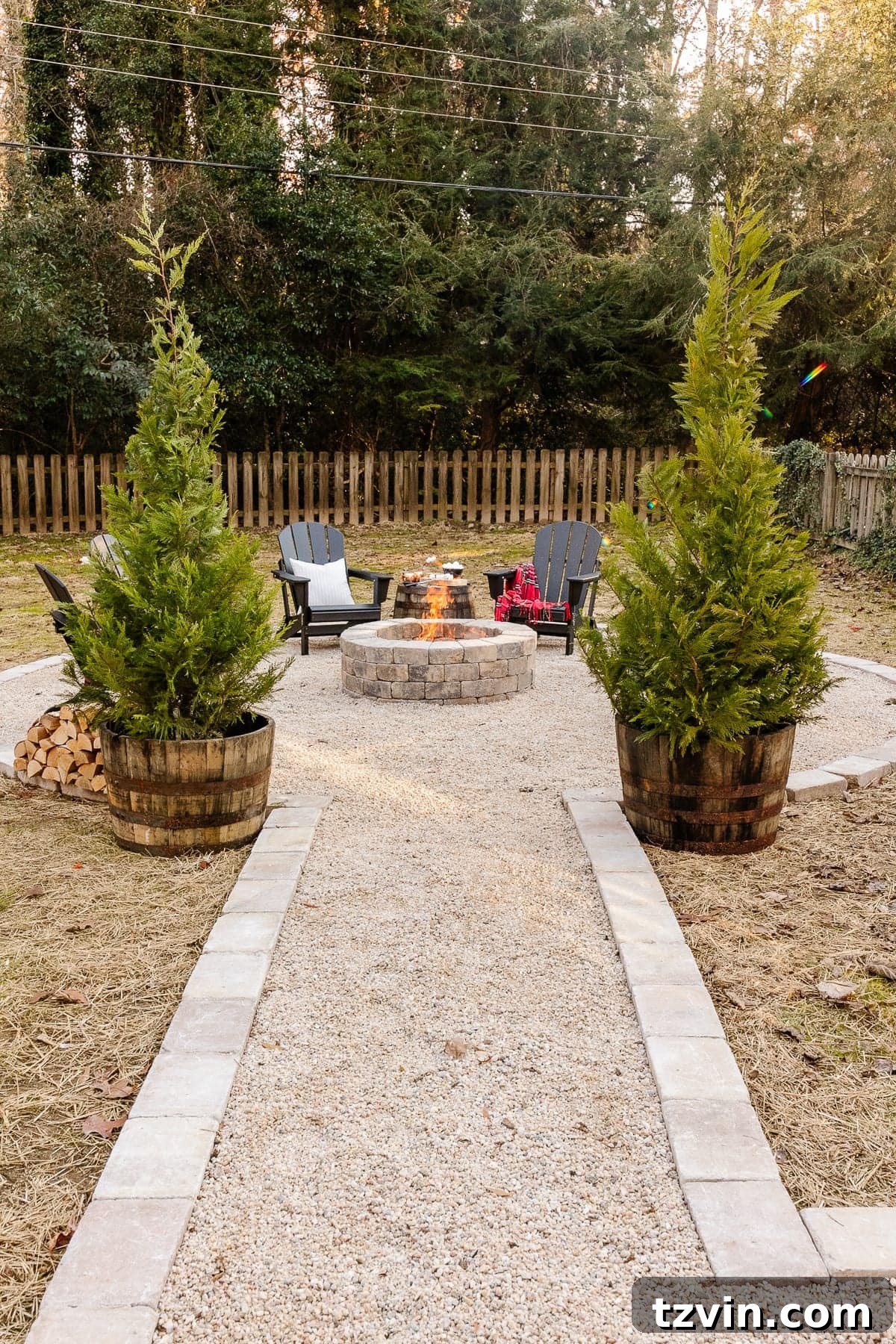 Weekend Pea Gravel Fire Pit: A DIY Build 23 backyard Fire pit with pea gravel, stone edge, and black adirondack chairs