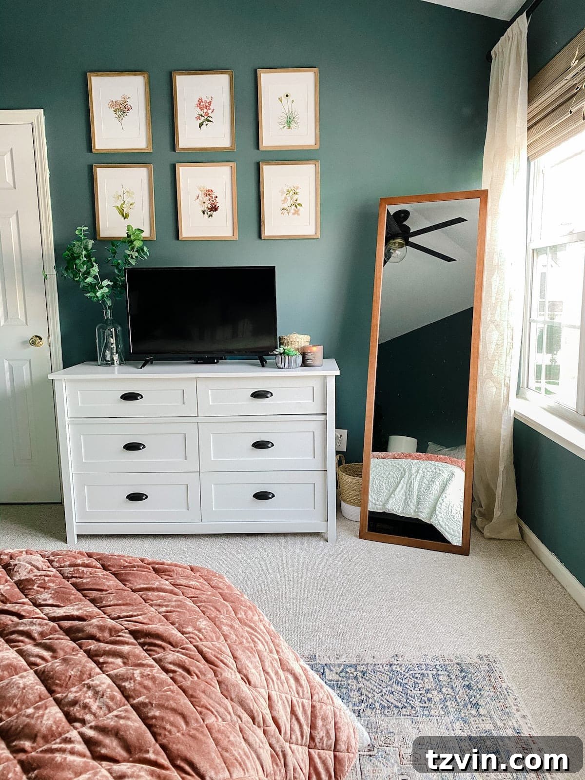 Transform Your Bedroom into a Serene Spa Sanctuary 19 Bedroom view showing a TV flanked by framed botanical prints