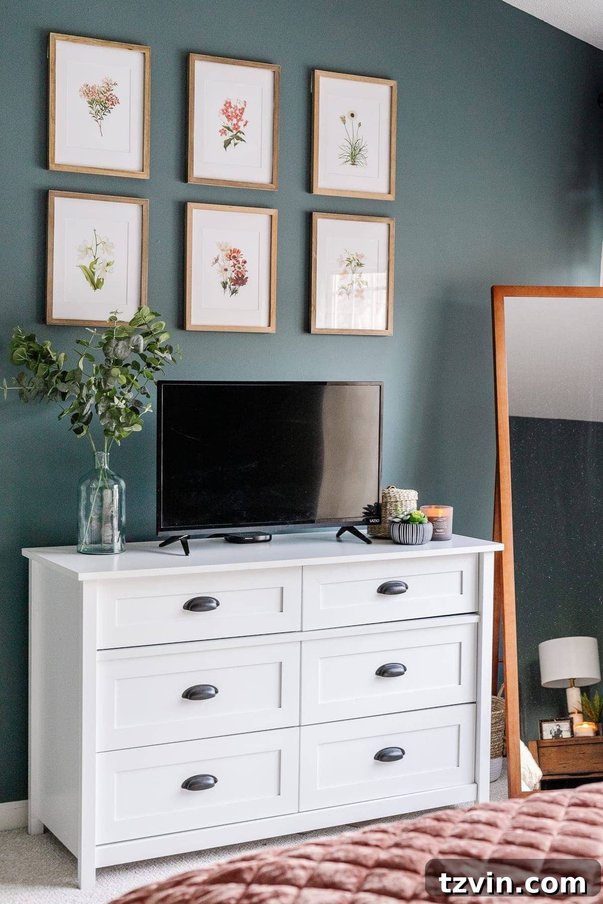 Transform Your Bedroom into a Serene Spa Sanctuary 21 Styled dresser with a plant, candle, and other decorative elements