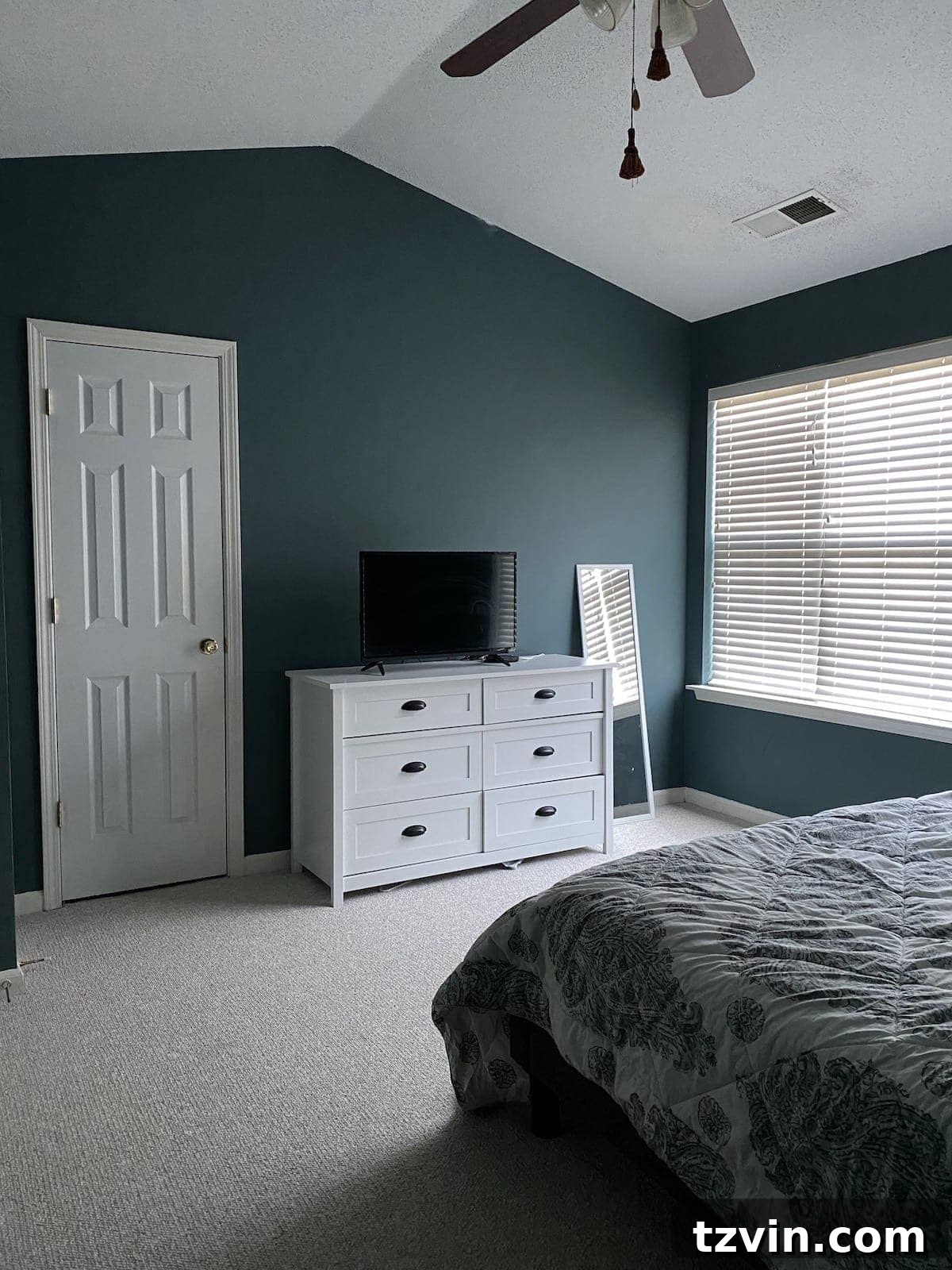 Transform Your Bedroom into a Serene Spa Sanctuary 5 Bedroom before makeover, featuring simple furniture and unadorned window