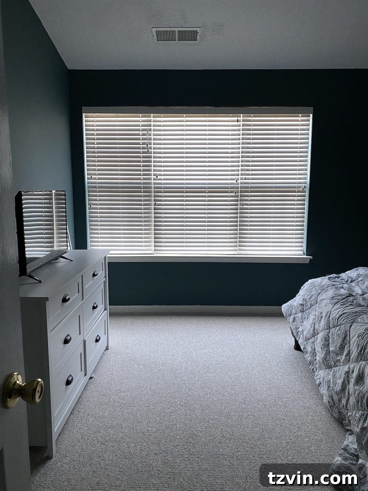 Transform Your Bedroom into a Serene Spa Sanctuary 7 Bedroom before makeover, dark with blinds closed, showing potential for natural light