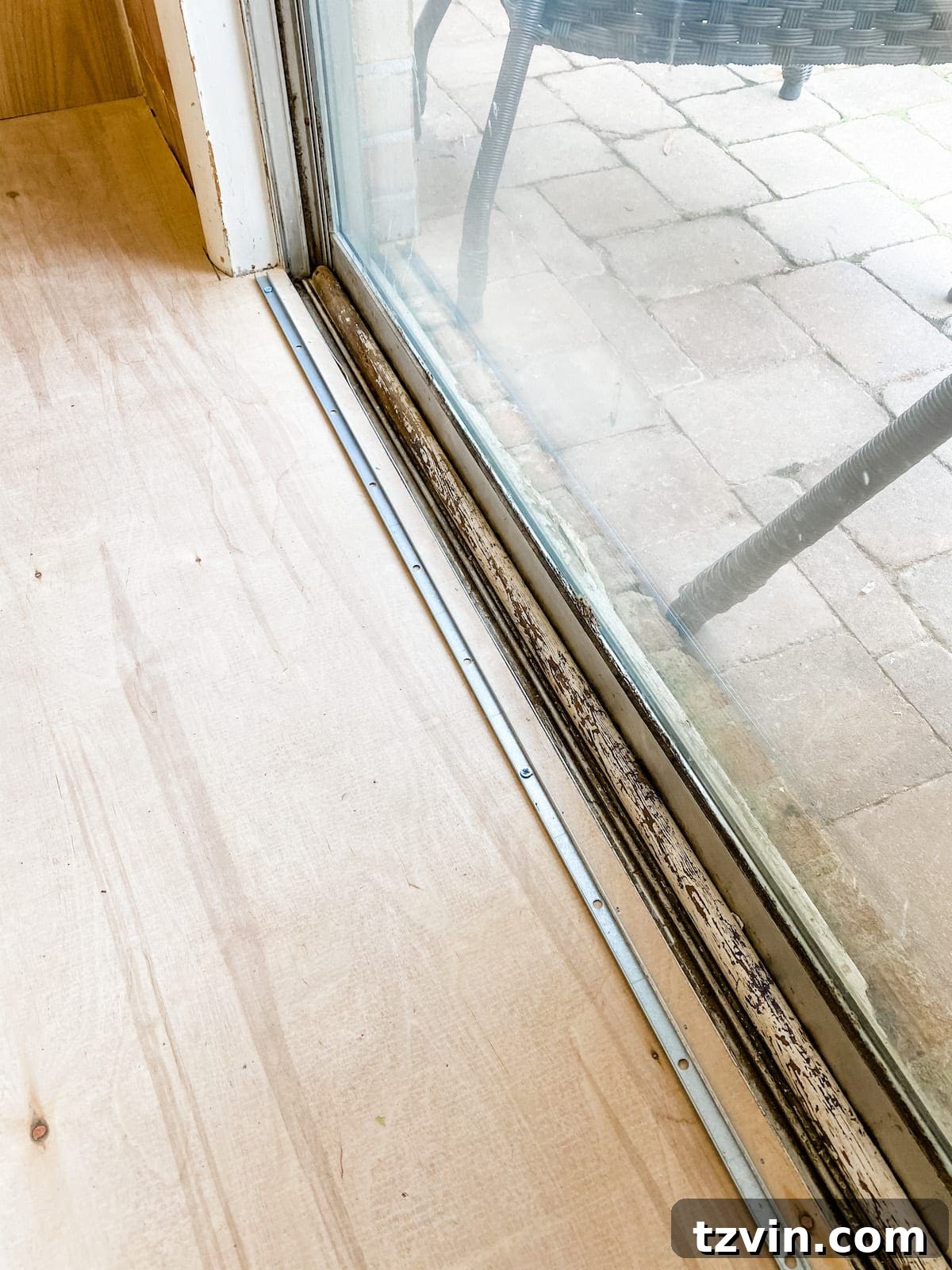 Mastering Luxury Vinyl Plank Installation 12 installing a threshold for luxury vinyl plank flooring at a doorway