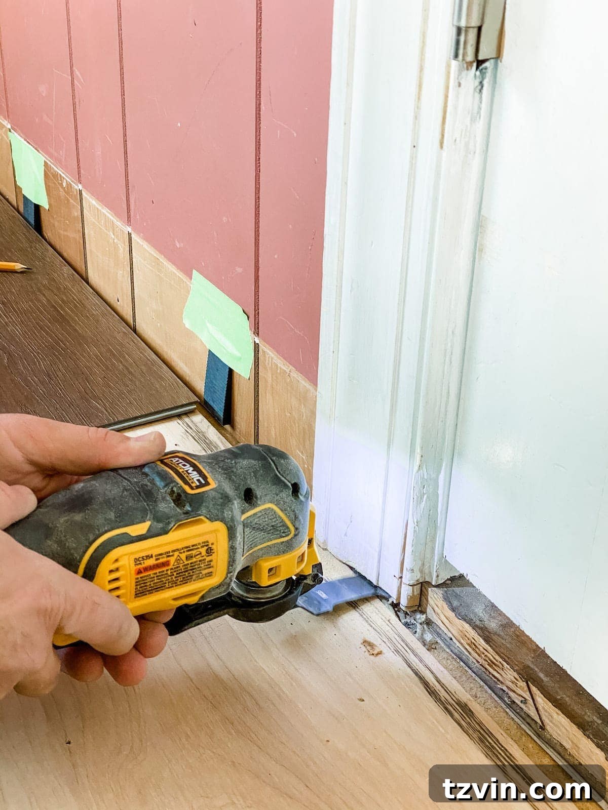 Mastering Luxury Vinyl Plank Installation 14 close-up of undercutting door jambs for luxury vinyl plank flooring installation