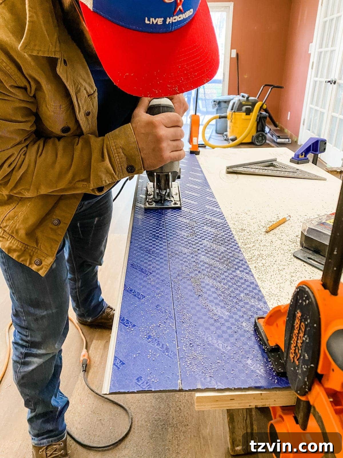 Mastering Luxury Vinyl Plank Installation 16 using a jigsaw to cut luxury vinyl plank flooring for intricate shapes