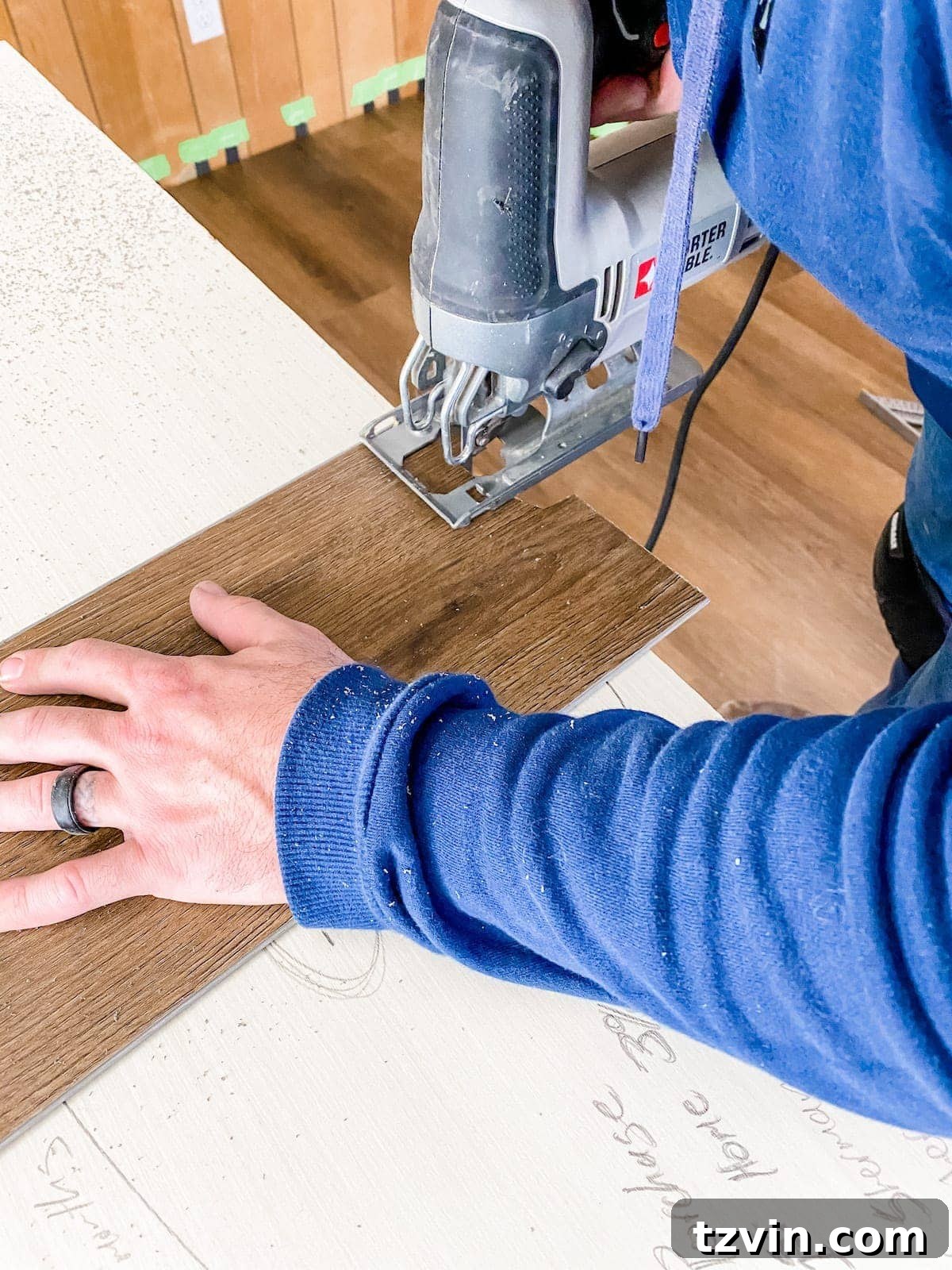 Mastering Luxury Vinyl Plank Installation 25 tracing an irregular shape from a contour gauge onto an LVP plank