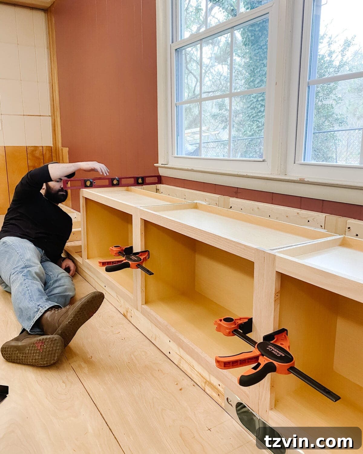 Custom Cabinetry and Window Bench Construction 17 Checking the Cabinets for Level