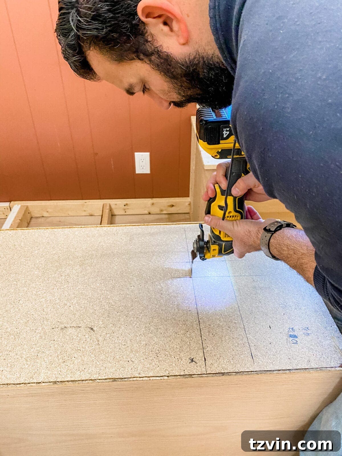 Custom Cabinetry and Window Bench Construction 20 Cutting Out for the Outlets