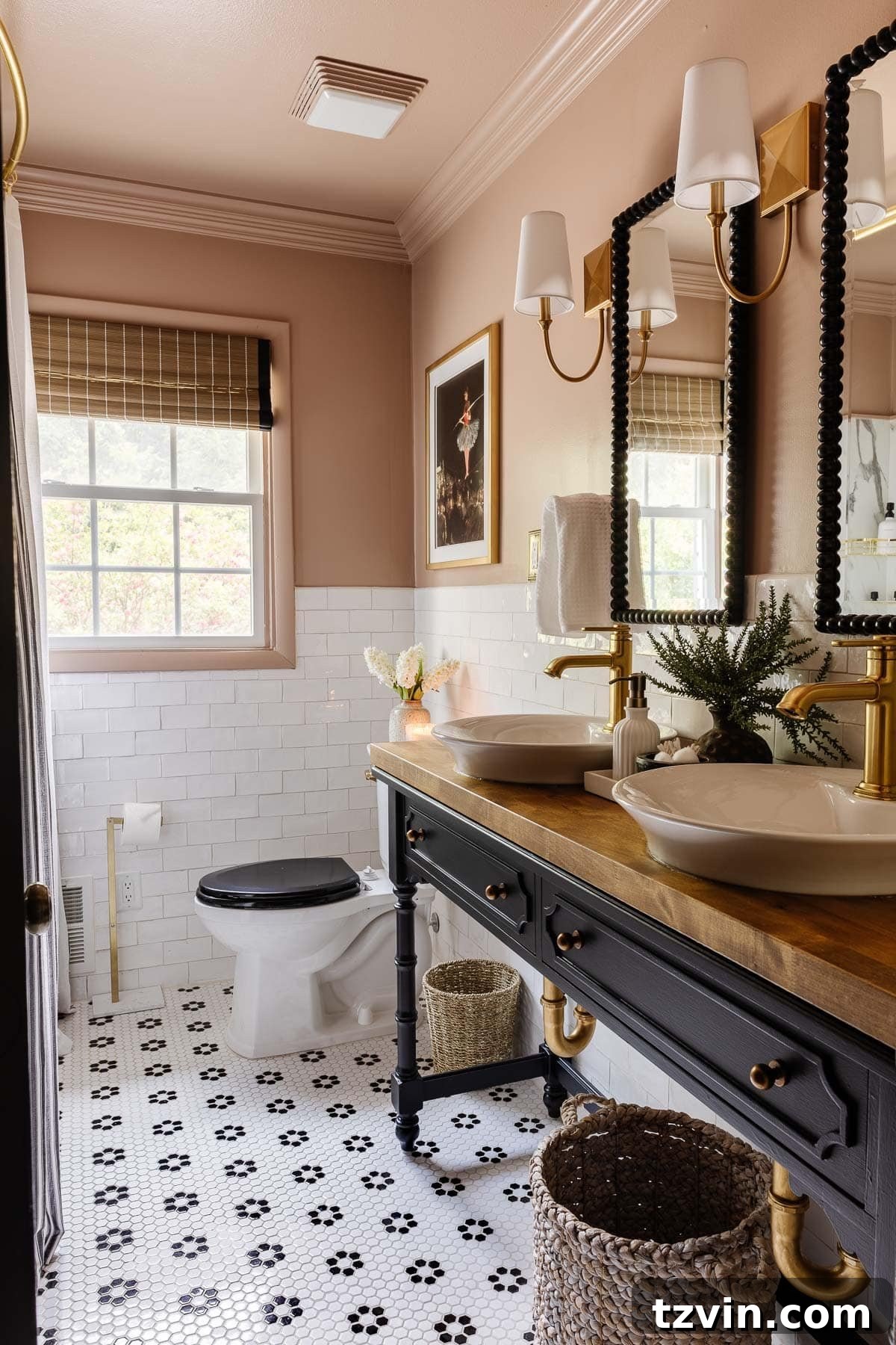 Pink and black bathroom makeover for girls, featuring vibrant color drenching.