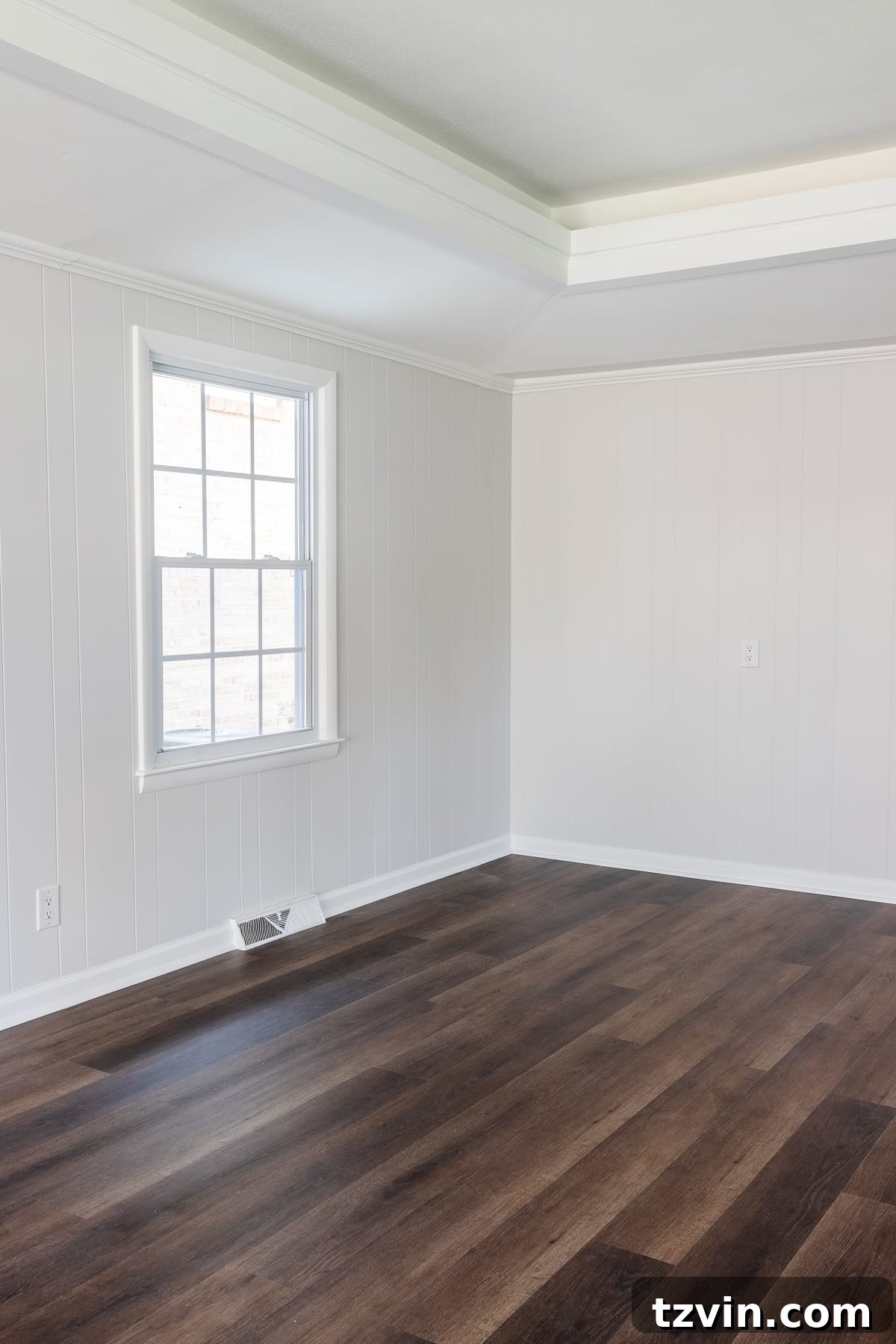 Stylish rec room with furniture and decor, showcasing the lasting beauty of Romabio Feather paint.