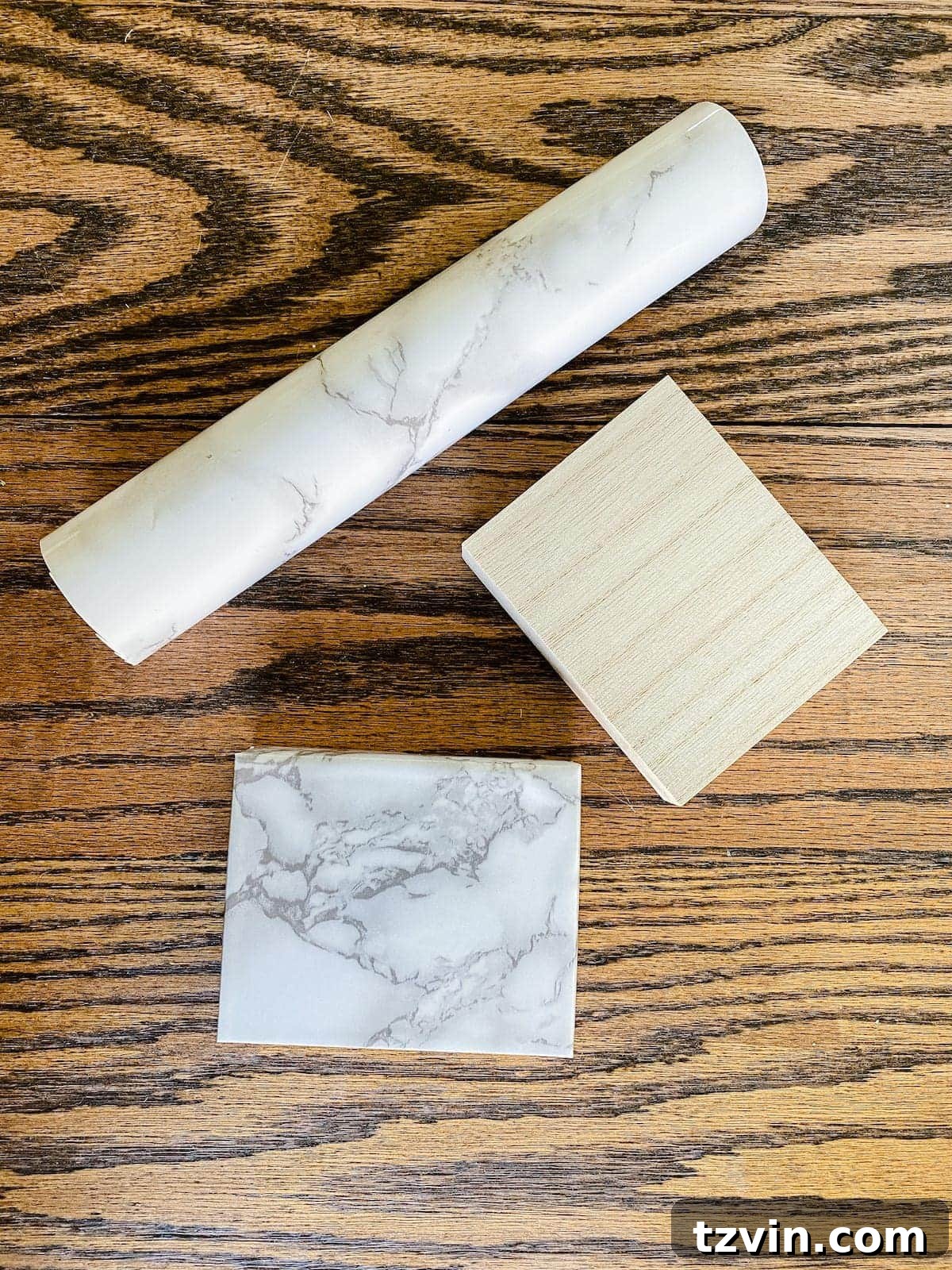 Luxe for Less: DIY Gilded Designer Sculpture 5 scrap wood block wrapped in marble contact paper