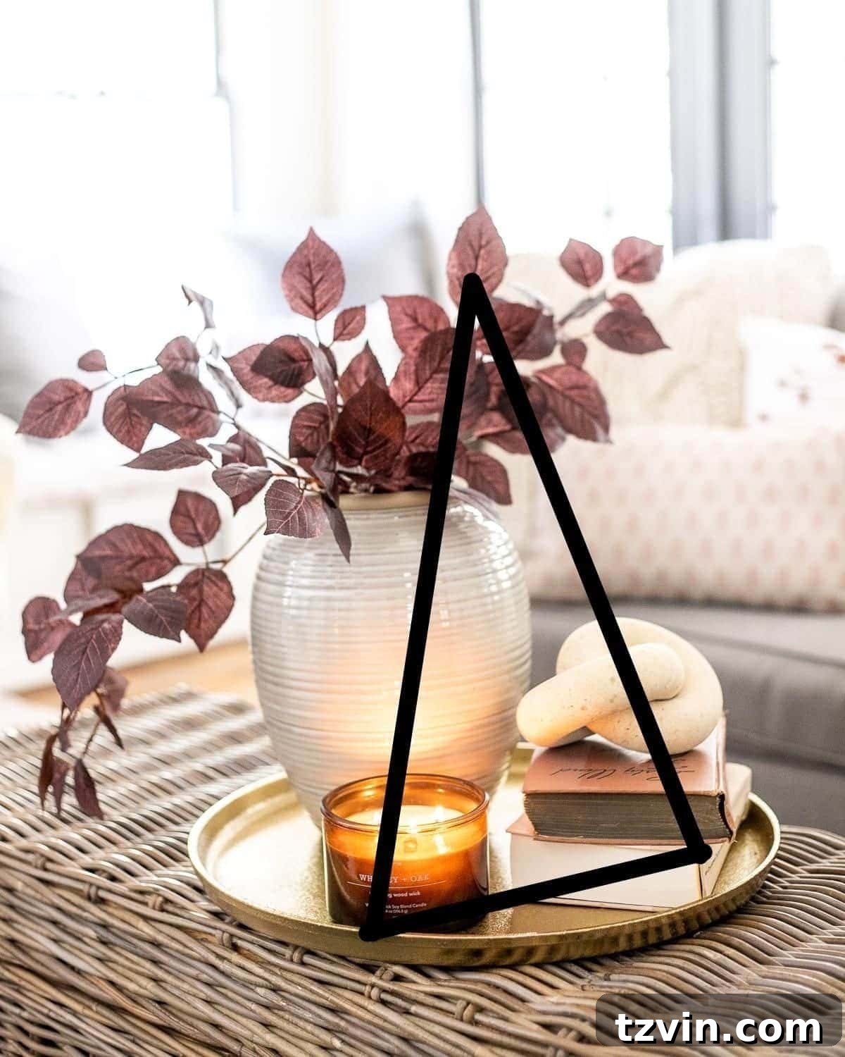 Here's the original title, followed by a single, unique, and engaging alternative: Original: Easy Coffee Table Decor Ideas and How to Style Them Alternative: Coffee Table Chic: Simple Styling Secrets 10 the decorator's triangle on a coffee table vignette
