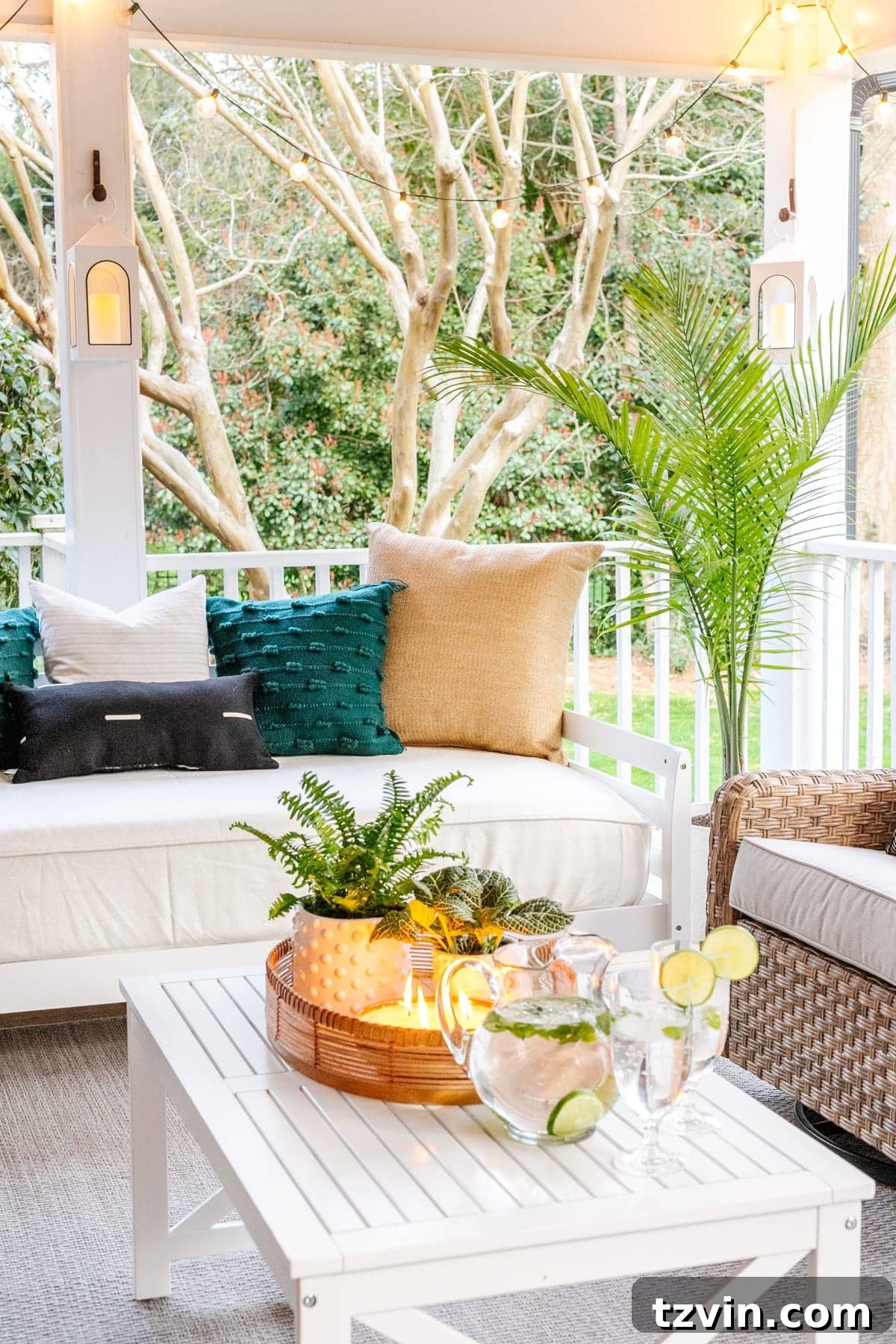 Back Porch Bliss Makeover 11 A vibrant collection of potted plants in various stylish planters creating a lush, garden-like atmosphere on the refreshed porch.