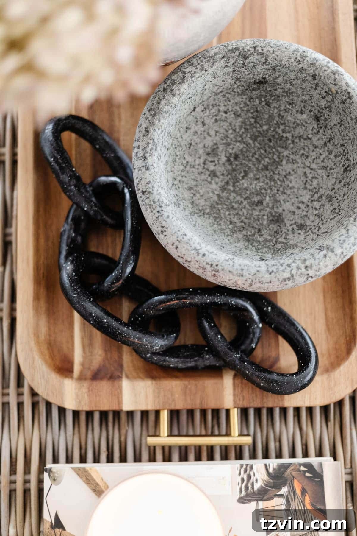 Create Decorative Chains from Air Dry Clay 4 A handmade decorative chain crafted from air dry clay, finished with black and white paint to mimic a stone or granite texture.