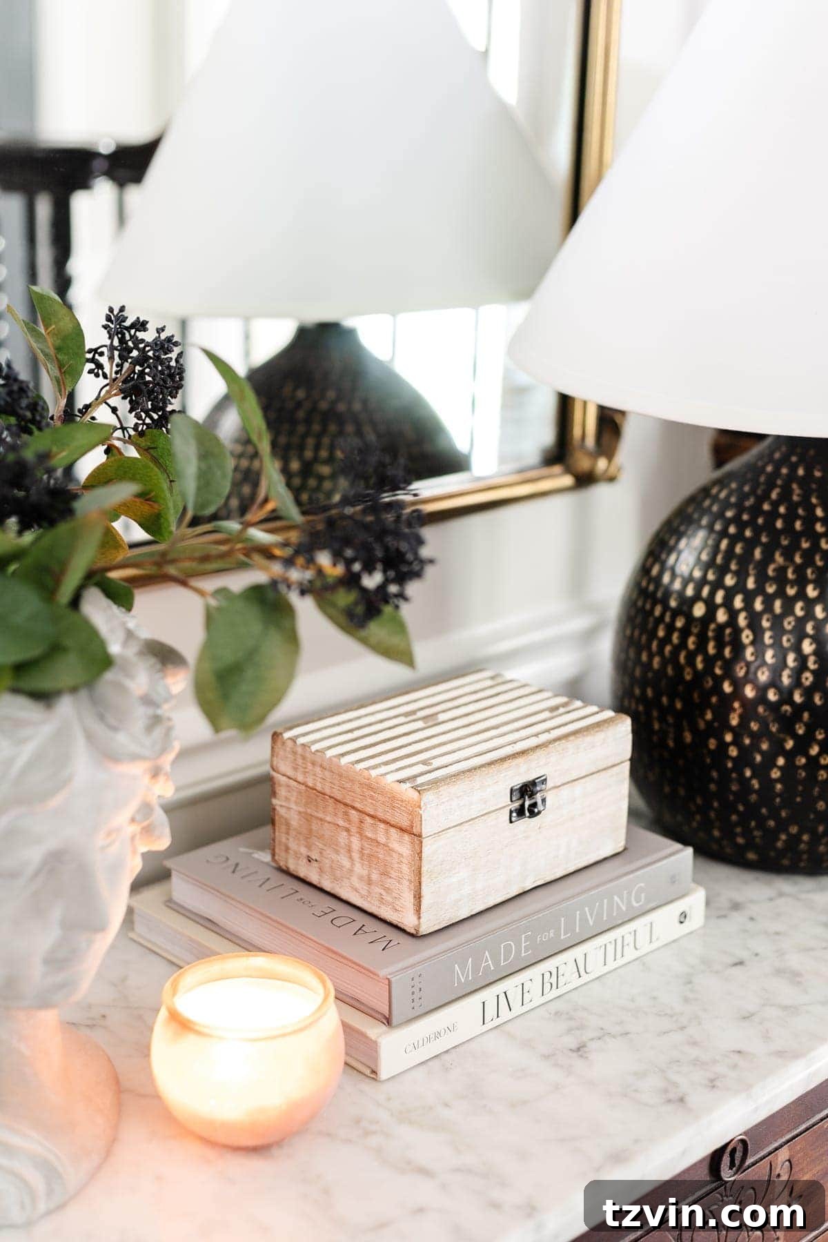 Curated Coffee Table Collections for Every Passion 2 Stylish coffee table books arranged on a wooden table, featuring diverse topics like art and travel, enhancing home decor