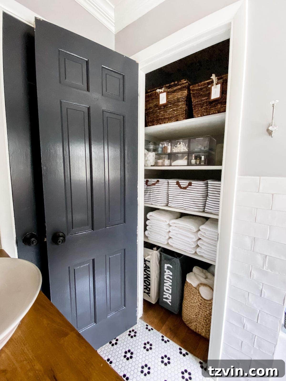 Kids' bathroom featuring personalized step stools, adding a playful and practical touch for children.