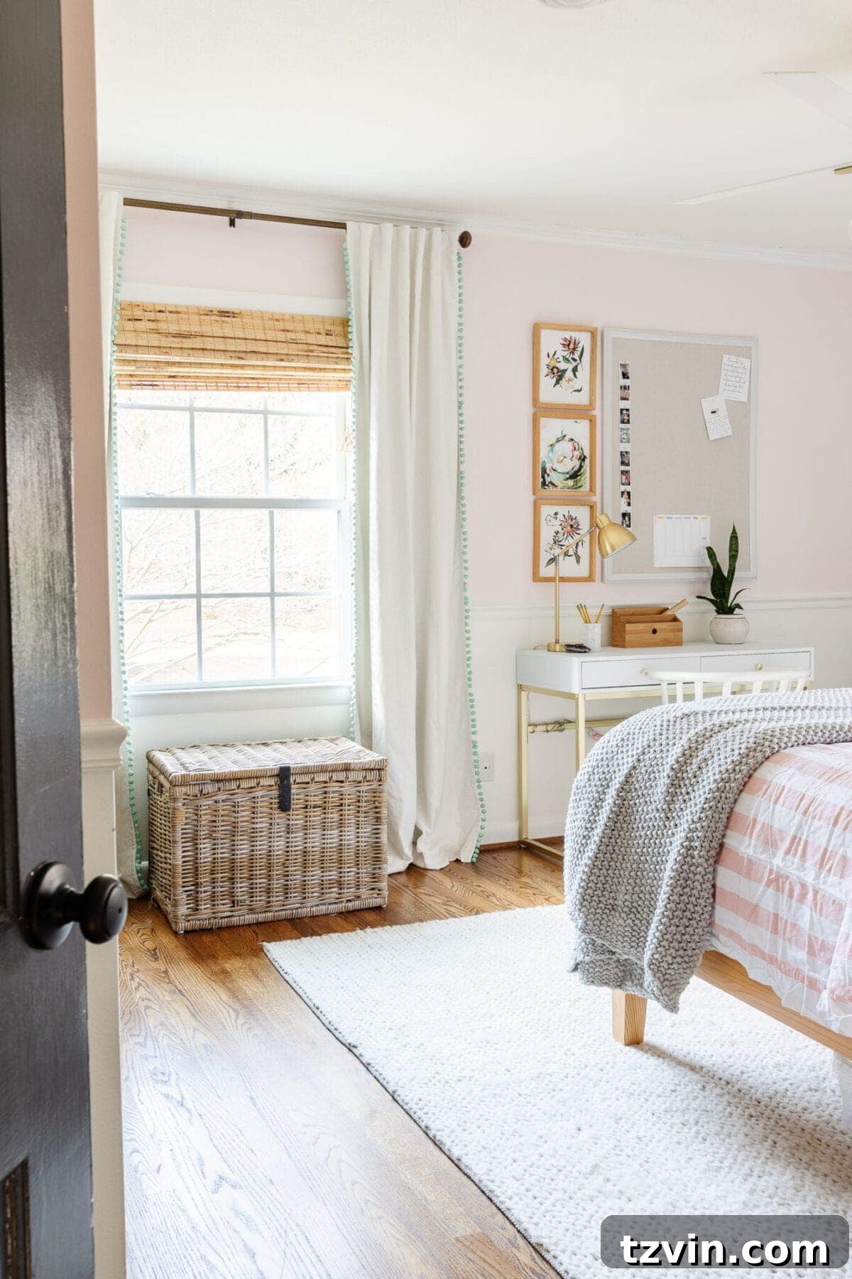 Olivia's preteen bedroom with Behr My Sweetheart walls, stylish wallpaper, and a functional homework station.