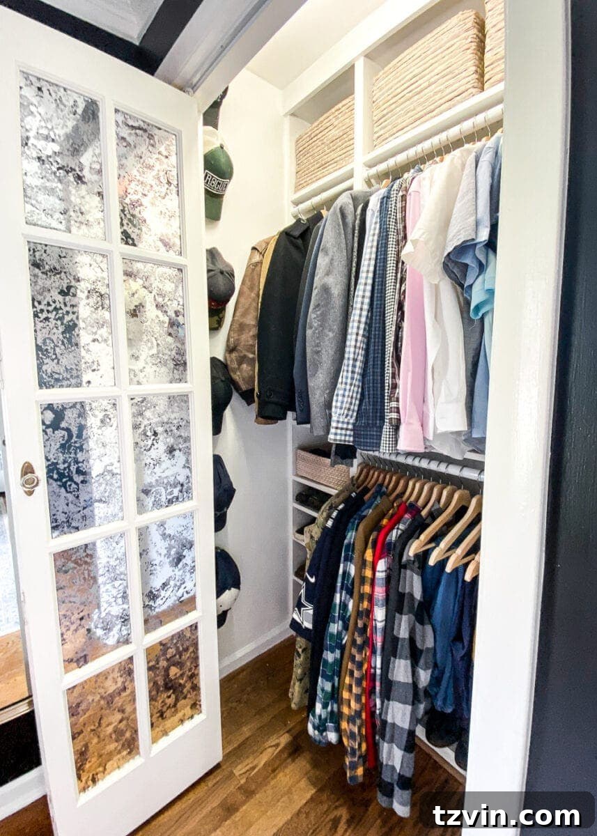 Smaller master closet section showing efficient use of space with custom shelving and smart storage solutions.