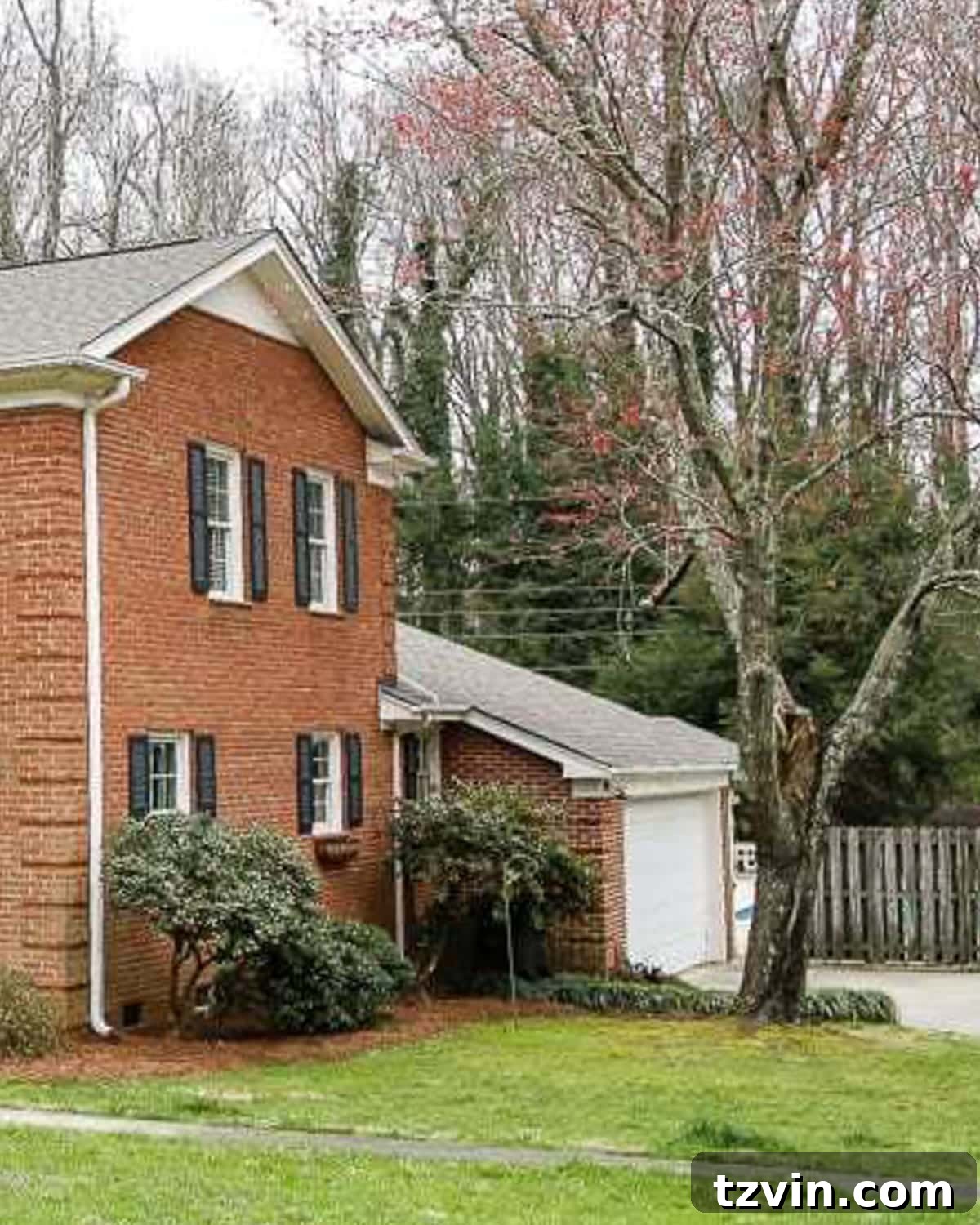 Before shot of the garage exterior, showing its uninspired original state.