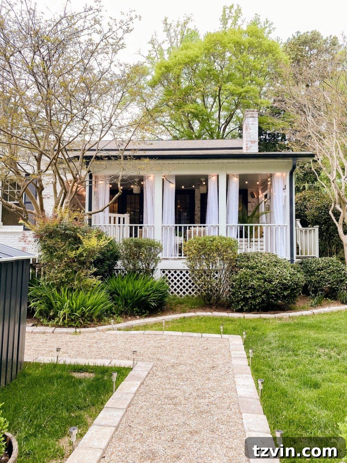 Updated back porch exterior, seamlessly integrated with the backyard landscape.