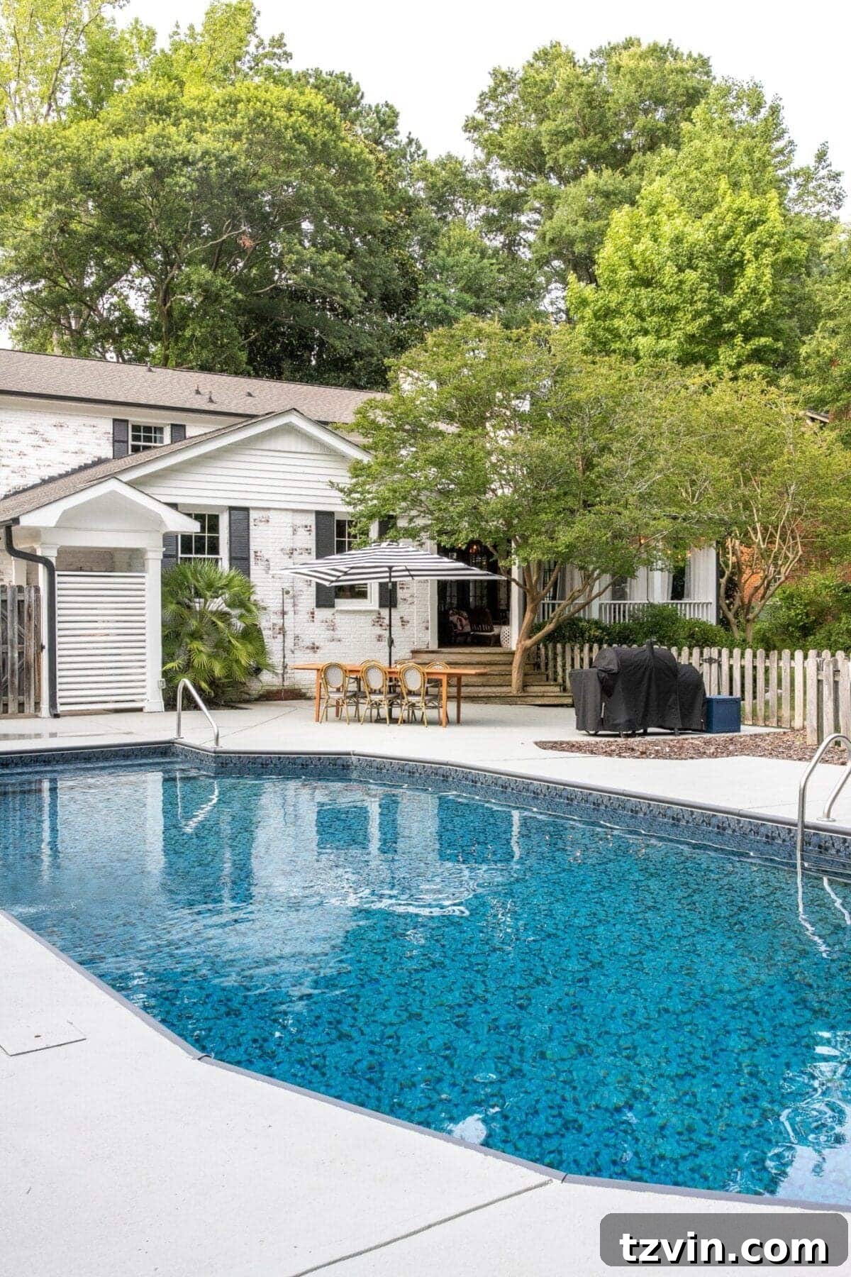 Relaxing scene by the pool, emphasizing the comfortable and inviting atmosphere.