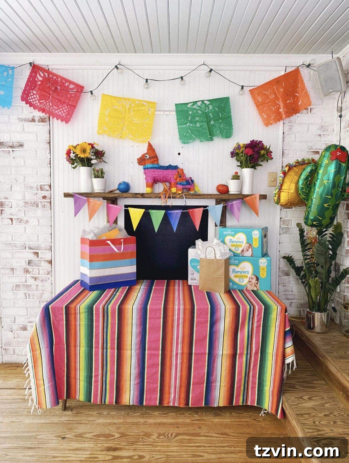 Make Your Baby Shower a Fiesta to Remember 6 Fiesta baby shower gift table adorned with colorful decor