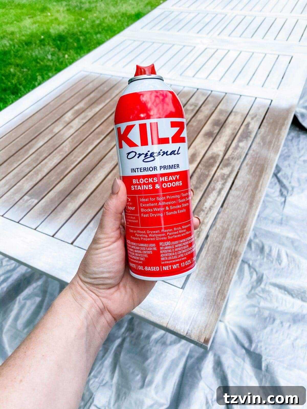 Craft Your Own Driftwood Style Outdoor Dining Table 4 Applying Kilz Original spray primer to outdoor furniture