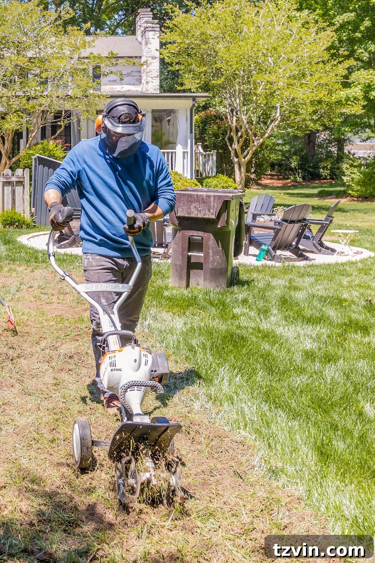 cultivating soil with a STIHL Yard Boss for bocce court