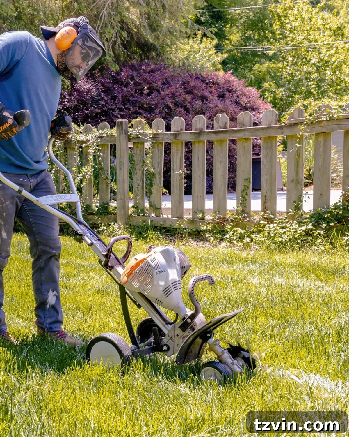 using a STIHL Yard Boss edger to cut bocce court perimeter