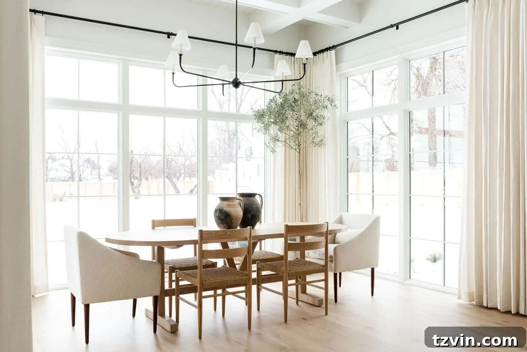 Reimagining Our Dining Room: A Modern Classic Makeover 6 Studio McGee dining room featuring an elegant oval dining table and classic chairs, illustrating modern classic design principles.