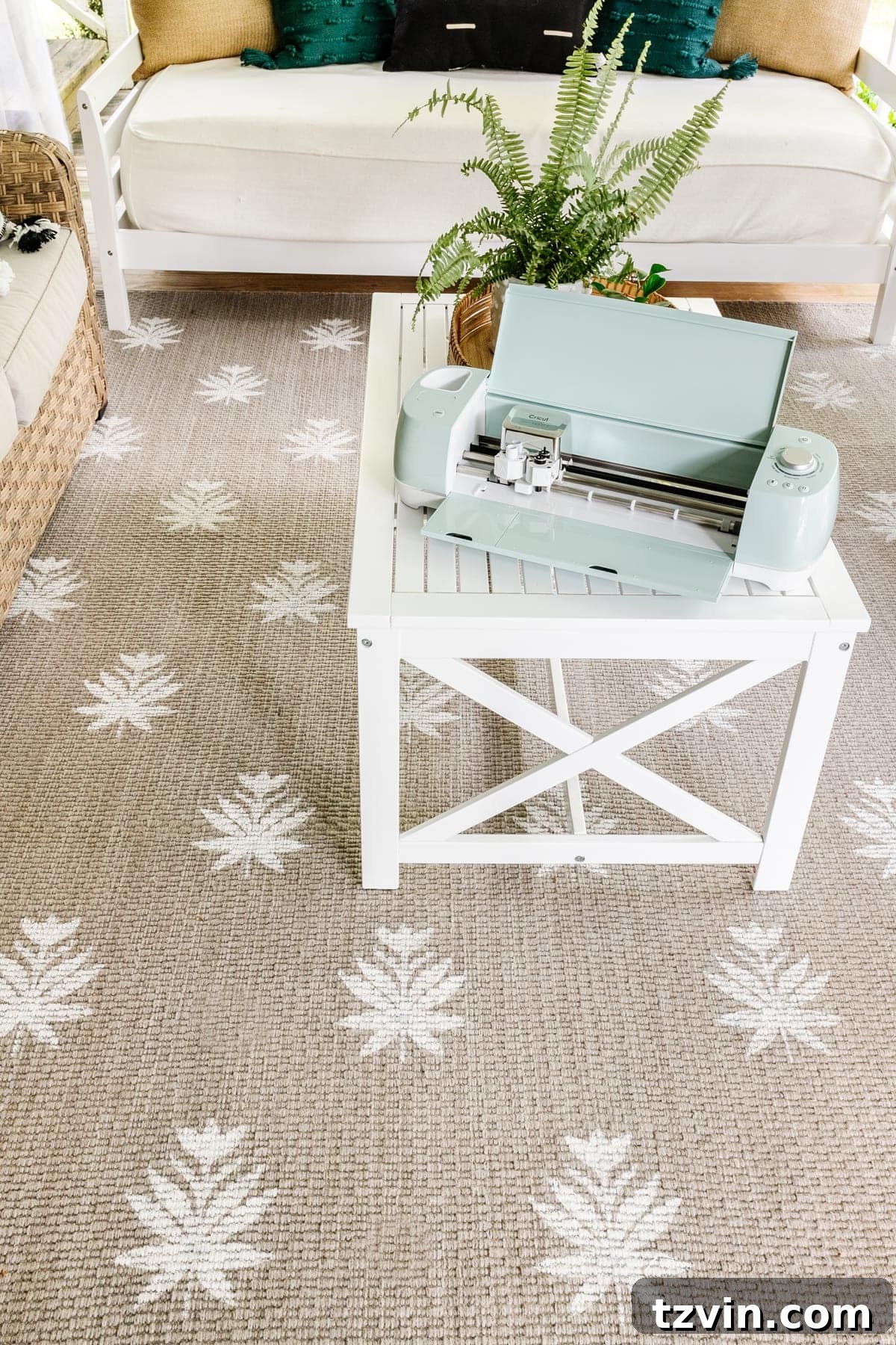 Outdoor patio with DIY floral block rug and comfortable seating