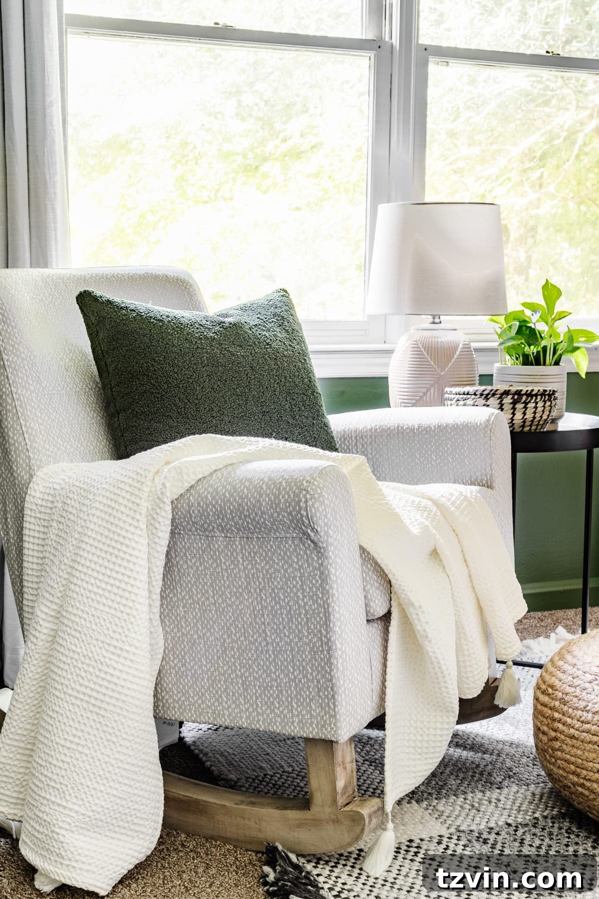 Our Cozy Woodland Wonderland: Baby Boy Nursery Transformation 11 Nursery rocker with side table and ambient lighting