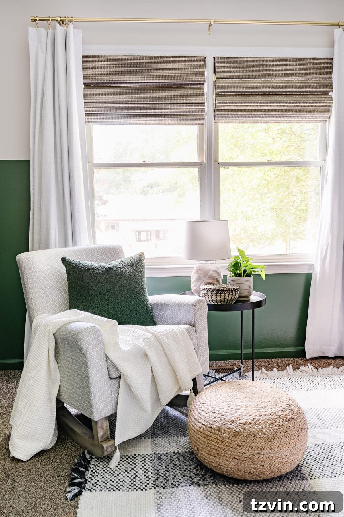 Our Cozy Woodland Wonderland: Baby Boy Nursery Transformation 13 Nursery with green paint, plaid rug, and gray rocking chair, showcasing cozy lighting