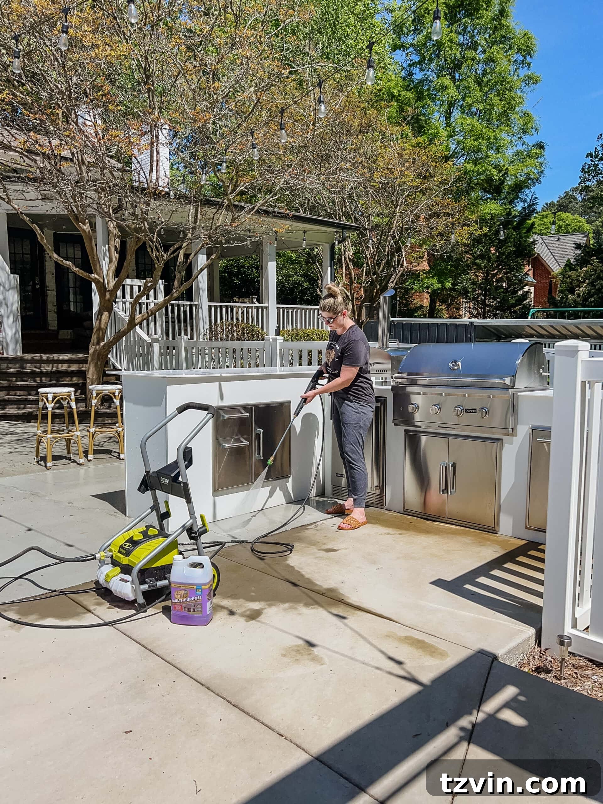 DIY Outdoor Kitchen Kit: Easy Build, Essential Knowledge 19 pressure washer cleaning an outdoor kitchen