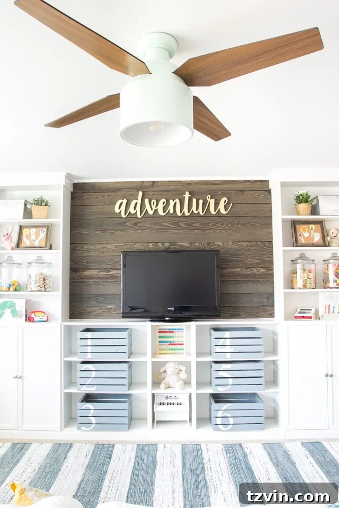 wood plank wall treatment with white built-ins in a playroom