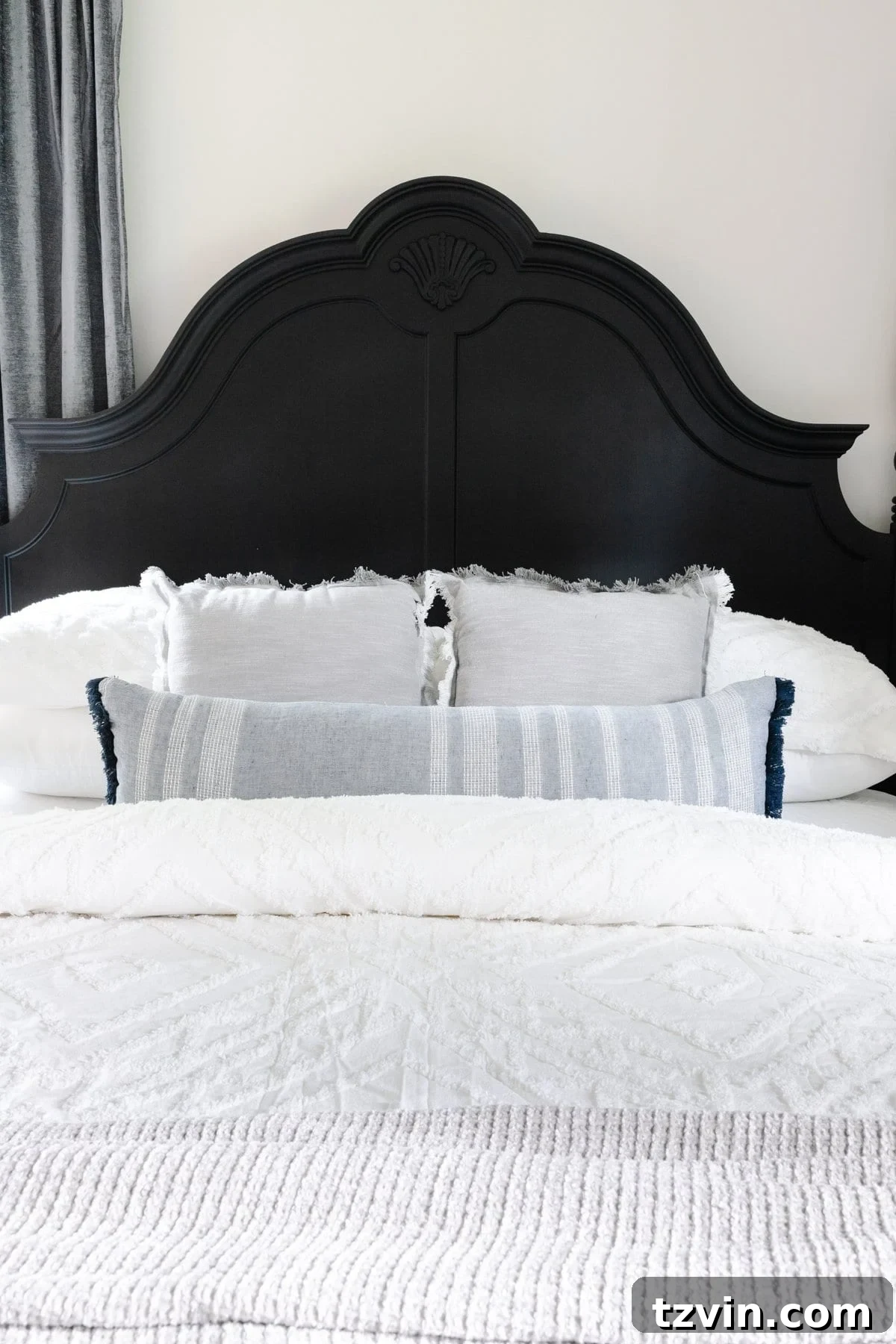 10 Clever Tricks to Make Your Small Bedroom Seem Bigger 8 black painted poster bed with white bedding