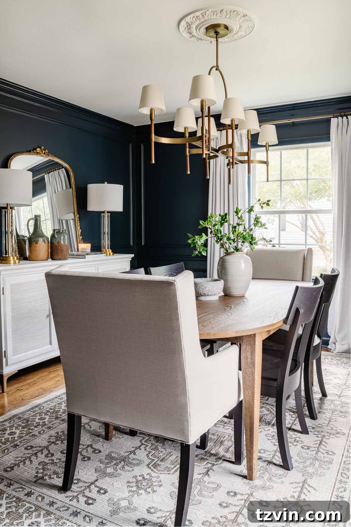 Bassett BenchMade Classic Modern Dining Furniture 14 classic modern dining room with mid century modern dining table, navy walls, black chairs, French mirror, and white buffet