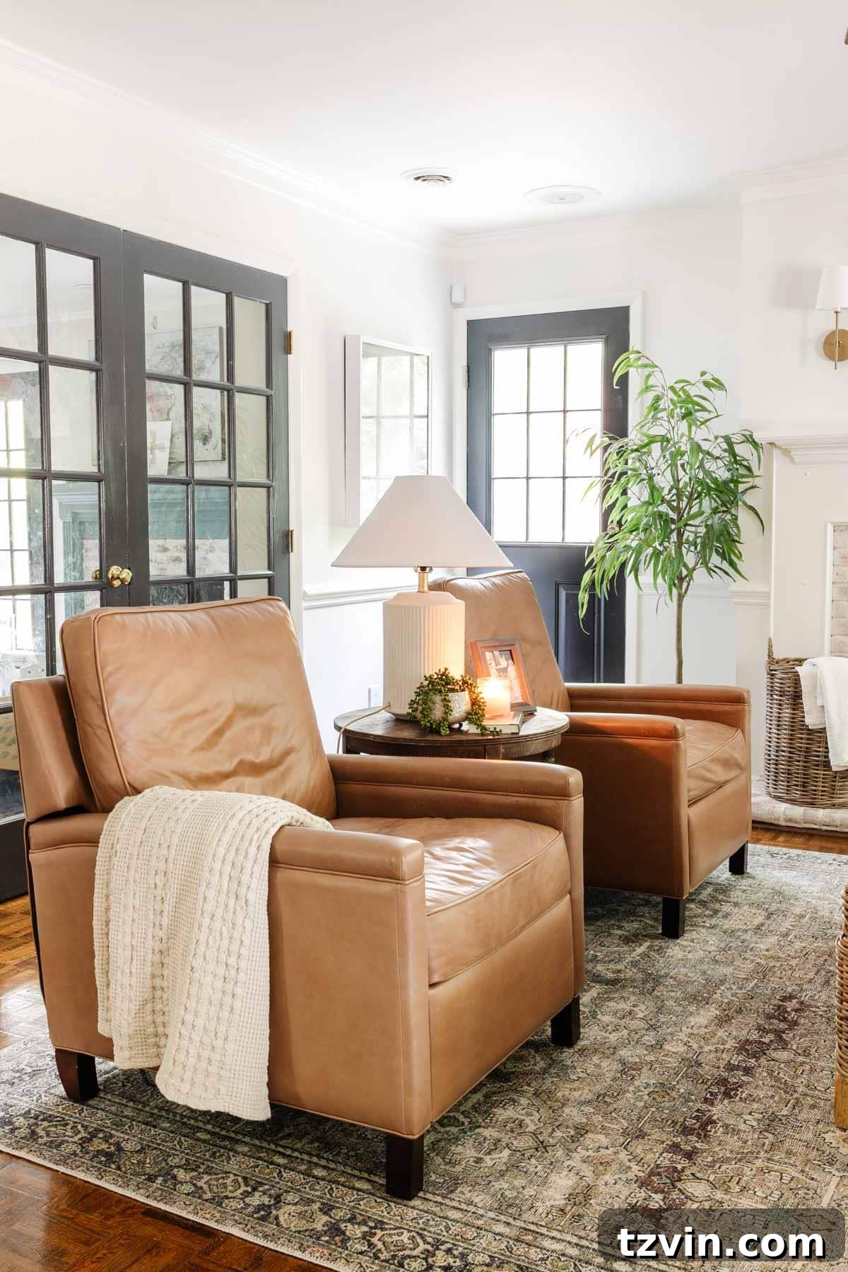 Pottery Barn Leather Recliner: Two Years Later, An Honest Appraisal 12 Two Pottery Barn Tyler square arm recliners positioned in a modern living room, showcasing their high legs and elegant form.