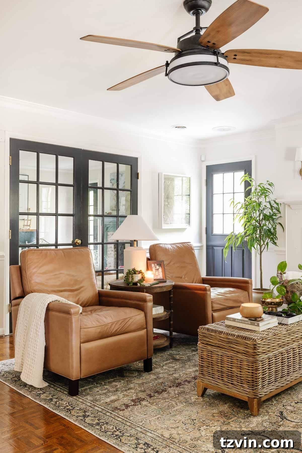 Pottery Barn Leather Recliner: Two Years Later, An Honest Appraisal 5 Two modern high-leg leather Pottery Barn recliners anchoring a cozy living room space, emphasizing their elegant design.